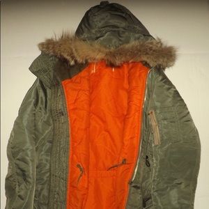 Used winter jacket with fur hood